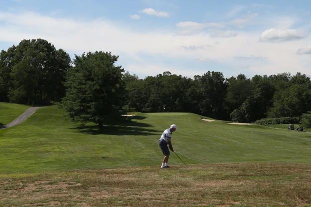 one golfer is trying to hit the ball at Mohansic golf course